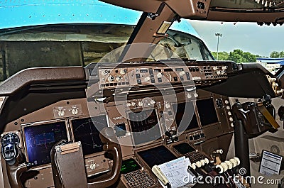 Cockpit view of a cargo airplane with the nose cargo door lifted open. 07/09/2015 - Hong Kong Editorial Stock Photo