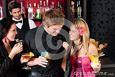 At cocktail bar friends during happy hours Stock Photo