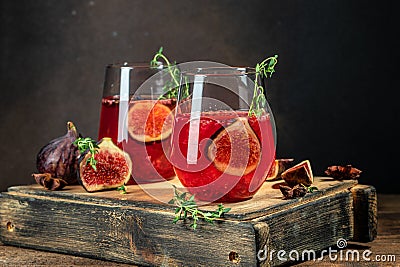 cocktail with fig, thyme in glass. Autumn detox drink. place for text Stock Photo