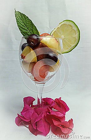 Cocktail of fresh season fruit with white background Stock Photo