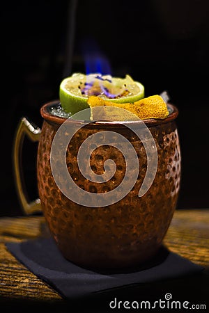Moscow mule cocktail with flame Stock Photo