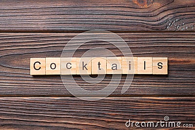 cocktails word written on wood block. cocktails text on cement table for your desing, concept Stock Photo