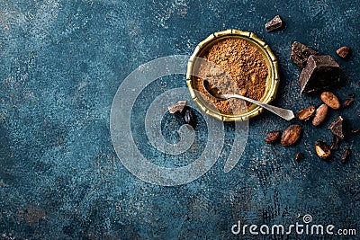 Cocoa powder, beans and dark chocolate pieces crushed, culinary background Stock Photo