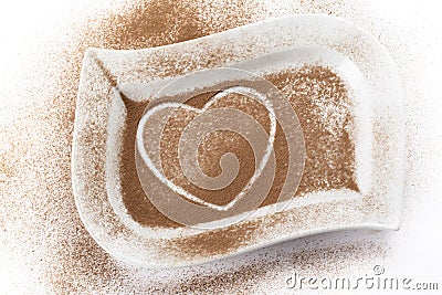 Cocoa powder with heart shape trace Stock Photo
