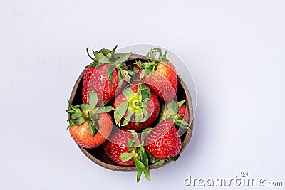 Coconut Bowl with Juicy Fresh Ripe Red Strawberries on Blue Background Tasty Berry Top View Stock Photo