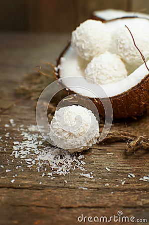 Coconut candy on a wooden surface Stock Photo
