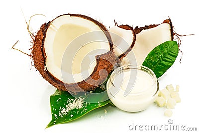 Coconut cocos with cream and green leaves Stock Photo