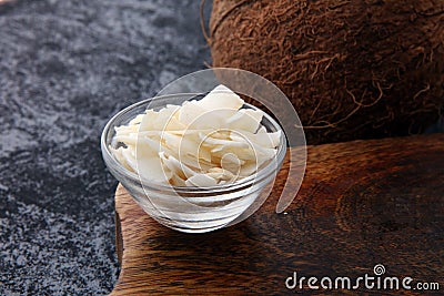 Coconut flakes with whole coconut. Tropical food concept Stock Photo