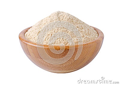 Coconut flour in wooden bowl isolated on white Stock Photo