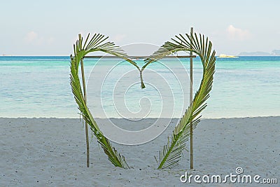 Coconut leaves heart in beach at Phuket, Thailand Stock Photo