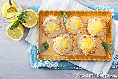 Coconut macaroon cookies with lemon curd Stock Photo