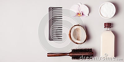 Coconut oil and and combs. Hair care concept Stock Photo