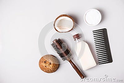 Coconut oil and and combs. Hair care concept Stock Photo