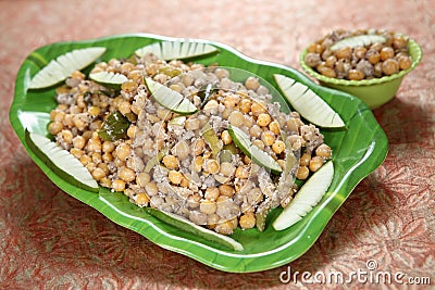 Coconut, raw mango, white peas checkpeas, Thengaai, mangai, pattani sundal Stock Photo