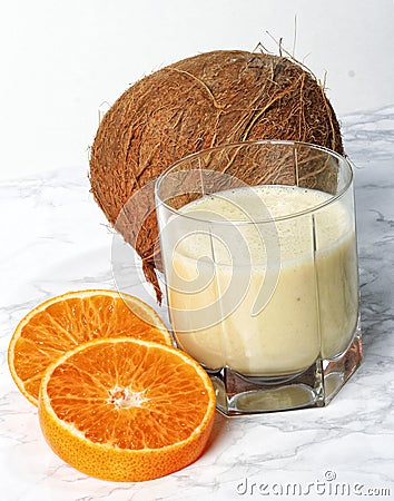 Coconut and tangerine smoothie Stock Photo