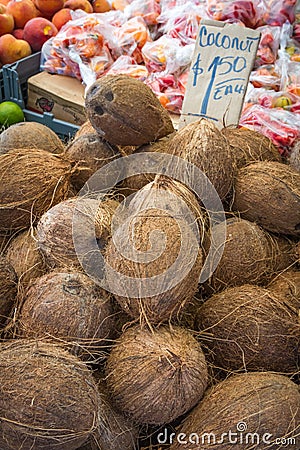 Coconuts for sale at a local market Stock Photo