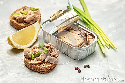 Cod liver fresh seafood healthy meal food. Sandwich with cod liver on rye bread. Health care concept. Natural source of omega 3 Stock Photo