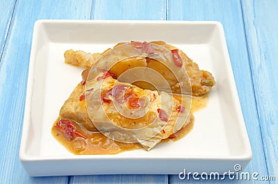 Cod with tomato Stock Photo