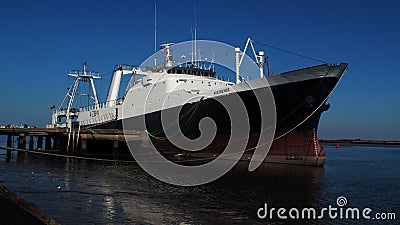 Codfish boat on docks Editorial Stock Photo