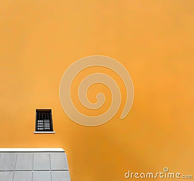 Minimalist yellow facade of a modern building Stock Photo