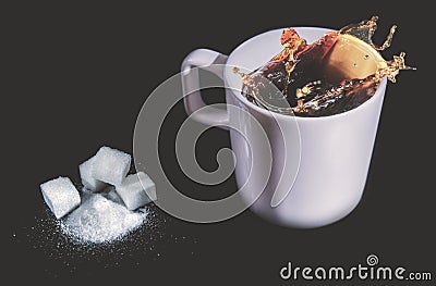 Coffe splash in a cup Stock Photo