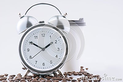 Coffee and alarm clock waiting together Stock Photo