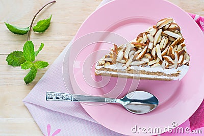 Coffee almond cake delicious with green mint on dish Stock Photo