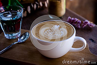Coffee aroma white cup on wood table in the morning time Stock Photo