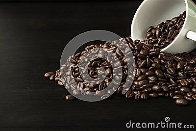 Coffee bean on black wood background Stock Photo