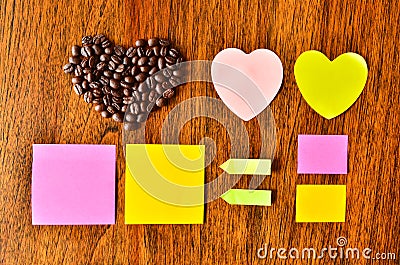 Coffee bean with heart shape and colorful stick note Stock Photo