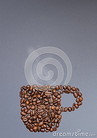 Coffee Beans arranged as a cup with steam Stock Photo