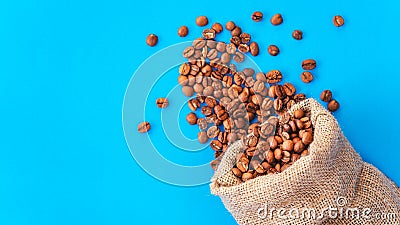 Coffee beans on blue background Stock Photo