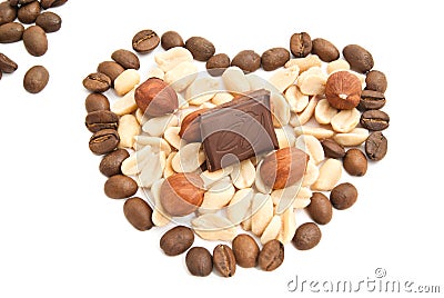 Coffee beans, chocolate, peanuts and hazelnuts Stock Photo