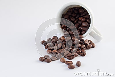 Coffee beans in coffee cup Stock Photo