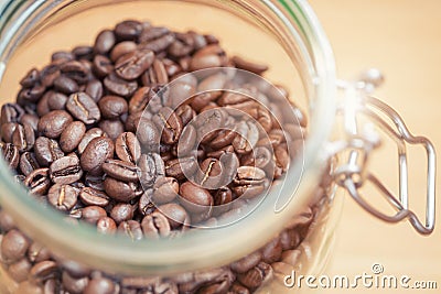 Coffee beans in glass jar Stock Photo