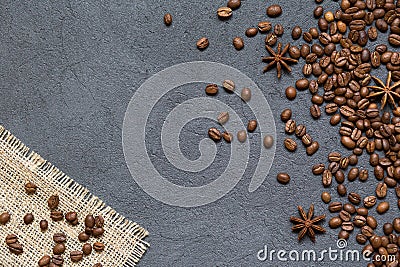 Coffee beans and ingredients on black stone background, top view Stock Photo