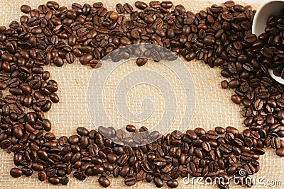 Coffee beans on jute sack Stock Photo