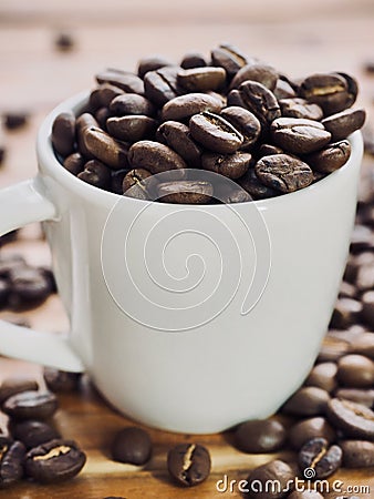 White espress cup and coffee beans Stock Photo