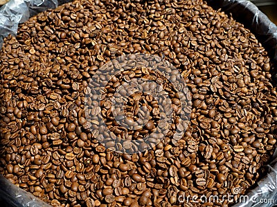 Coffee beans in a sack. Dried coffee sold by the kilo Stock Photo