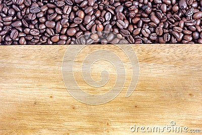 Coffee beans on wood background Stock Photo