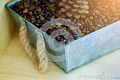 Coffee beans in a zinc crate Stock Photo