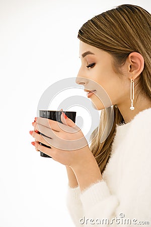 Coffee. Beautiful Girl Drinking Coffee. Stock Photo