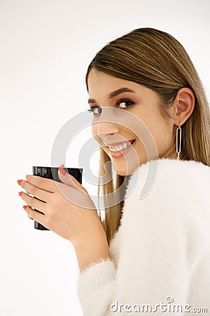 Coffee. Beautiful Girl Drinking Coffee. Stock Photo