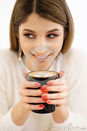 Coffee. Beautiful Girl Drinking Coffee. Stock Photo