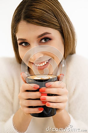 Coffee. Beautiful Girl Drinking Coffee. Stock Photo