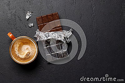 Coffee break bliss: Chocolate bar paired with a cup of coffee Stock Photo