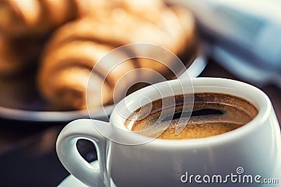 Coffee break business. Cup of coffee mobile phone and newspaper. Stock Photo