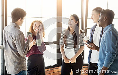 Coffee break chat at office Stock Photo