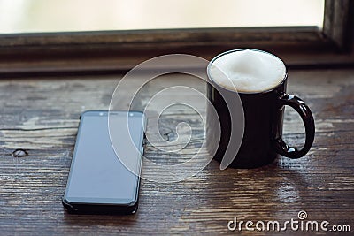 Coffee and burning cigarette in the photo Stock Photo