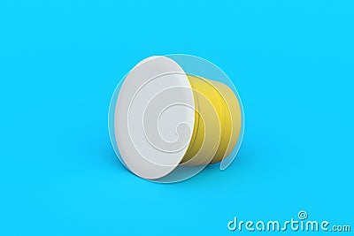 Coffee capsule on blue background. Modern decaf pod for machine. Stock Photo